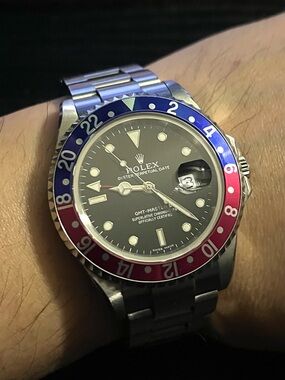 Rolex GMT-Master II Stainless Steel Watch with Blue and Red Bezel and Black Dial